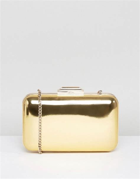 dune broncho rose gold metallic box clutch bag|dune london gold clutch purse.